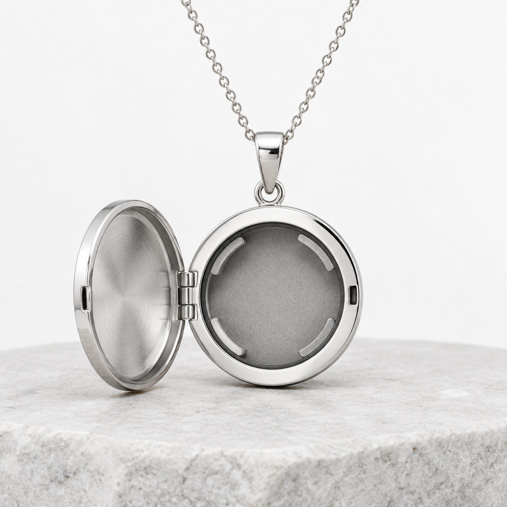 Round metal pet tag pendant that holds a tracker