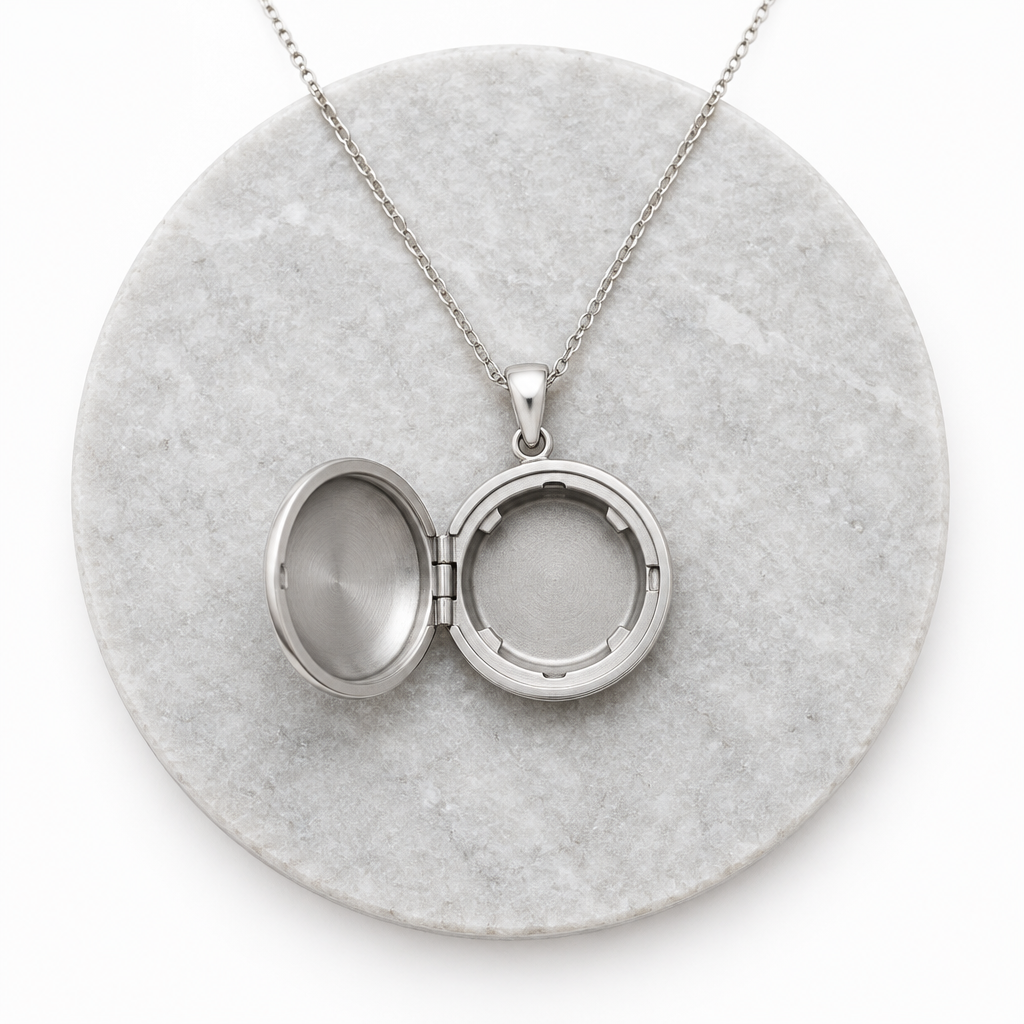 Round metal pet tag pendant that holds a tracker